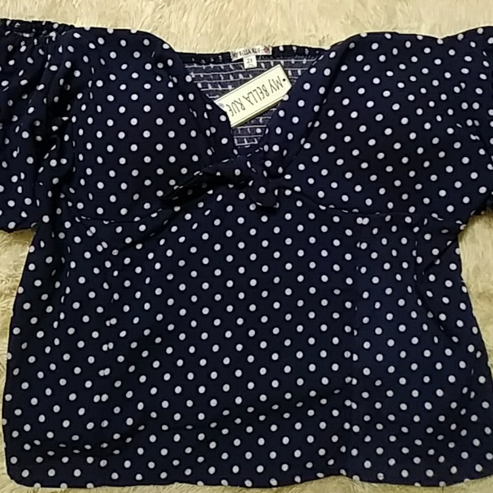 Cute polka dot shirt with peek a boo bow